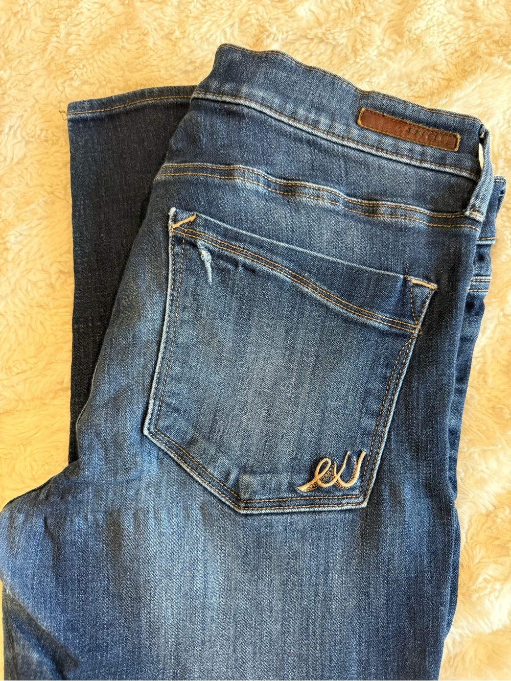 Express Women's Blue Mid Rise Skinny Jeans with Embroidered Back Pocket